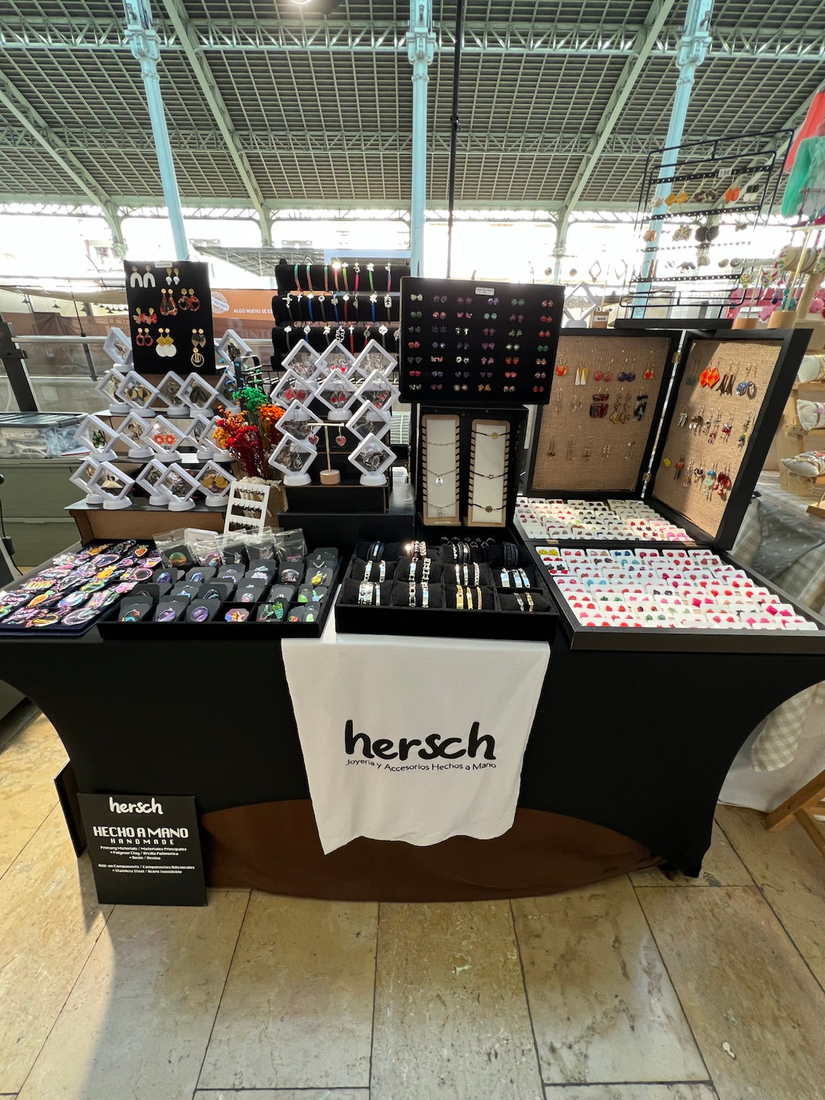 Expanded Hersch market table at Mercado Colon in February 2025