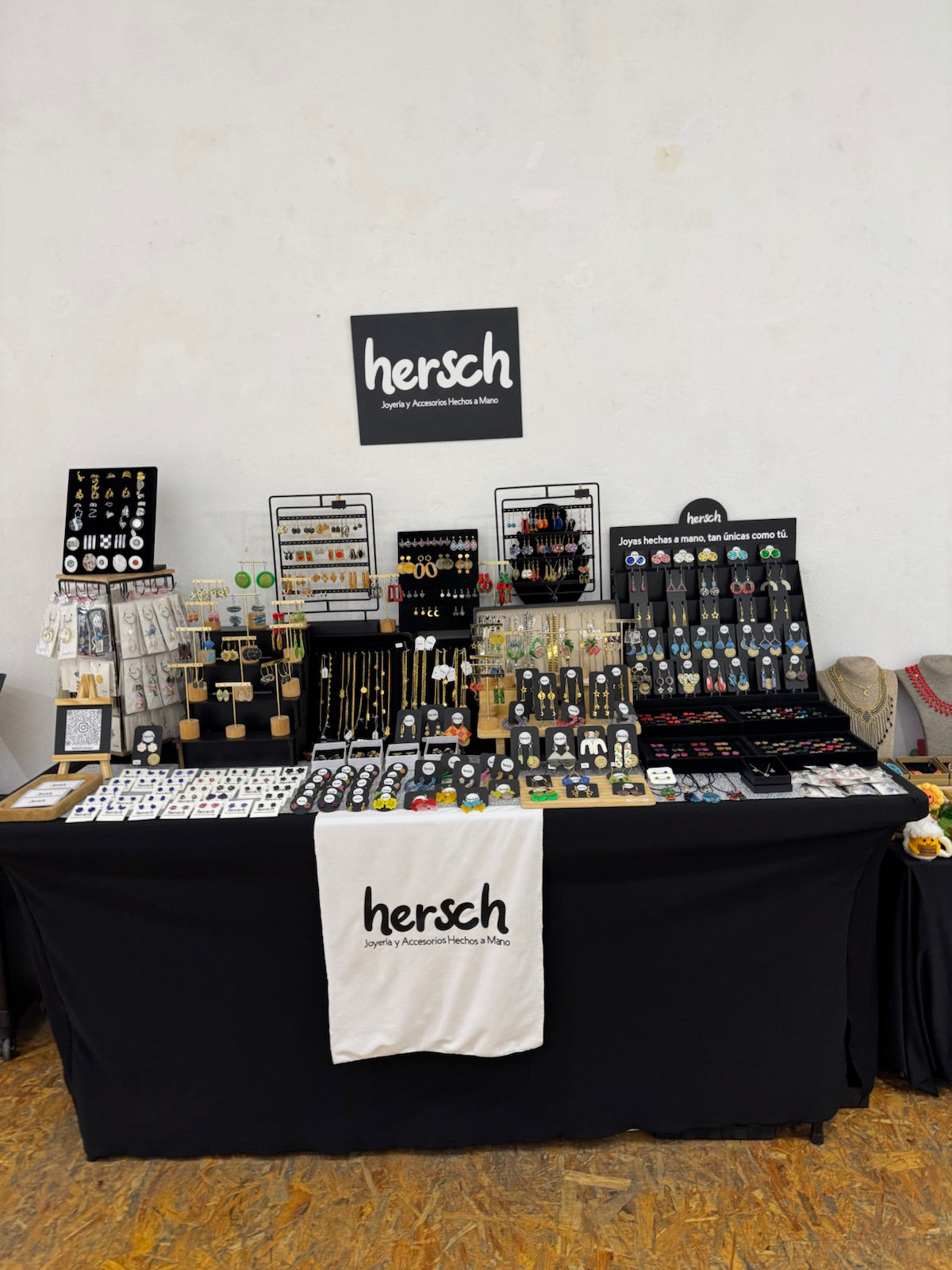 Wide Hersch jewelry table at a winter market in January 2026